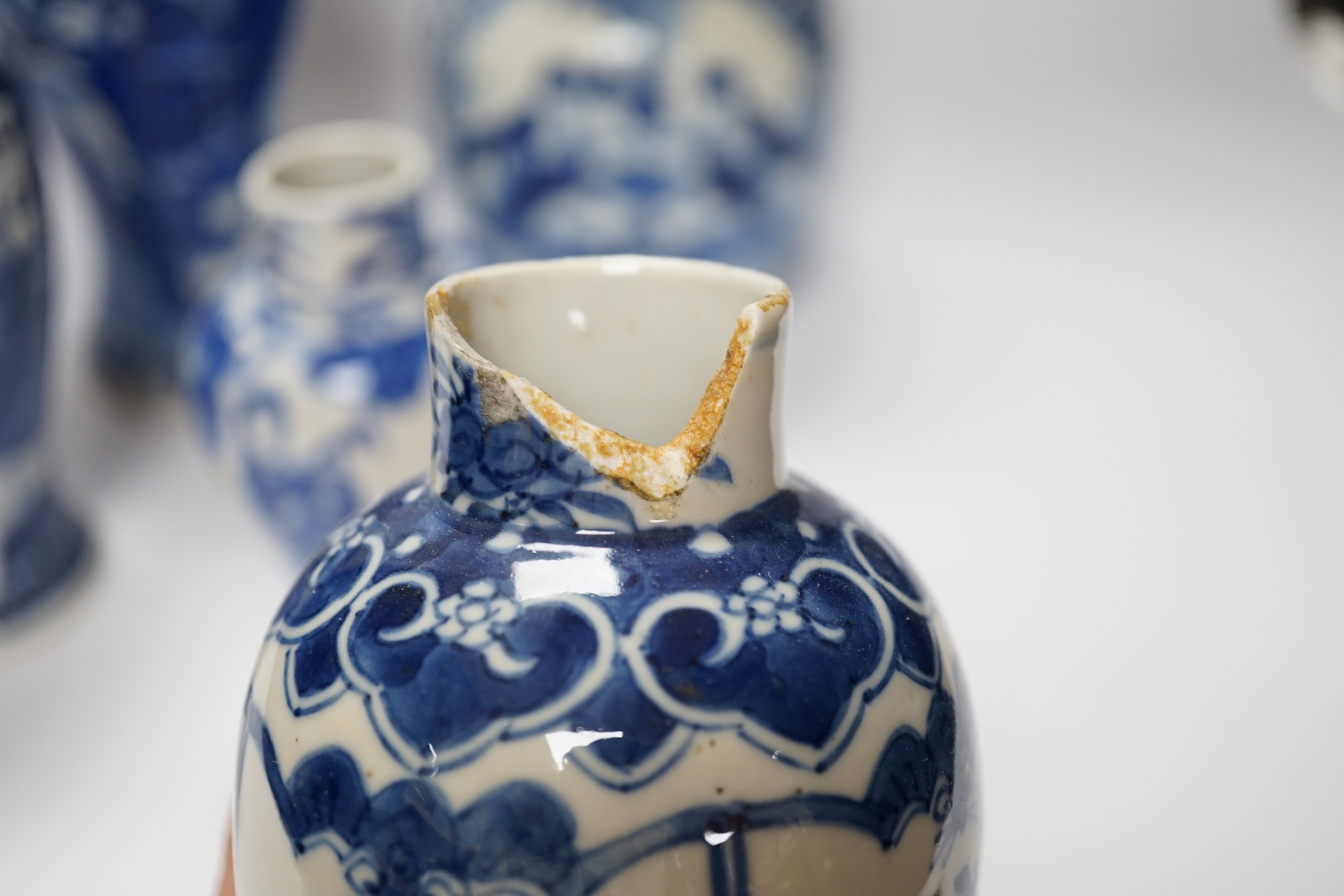Five 19th century Chinese various sized blue and white figural vases, tallest double gourd vase 27cm high